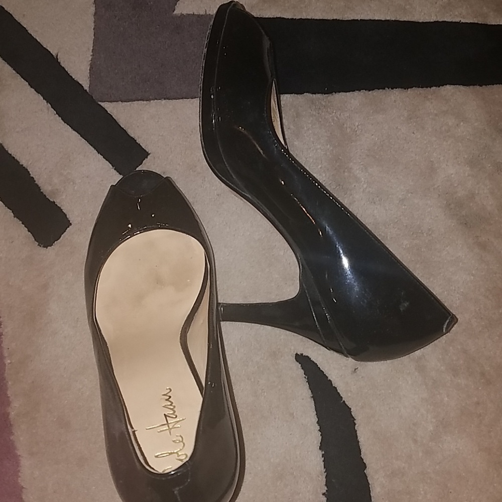 Black open toe heels. Good condition.